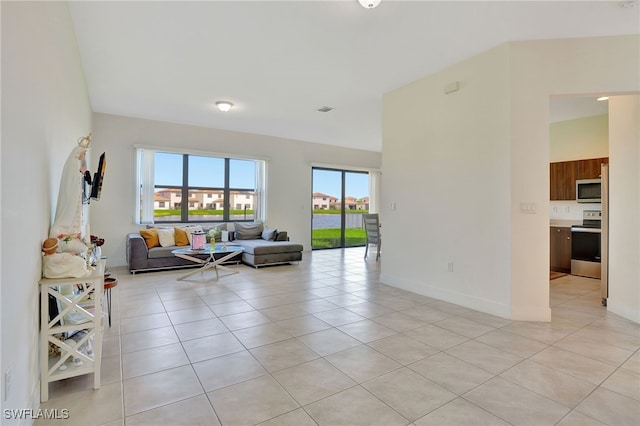 living room with light tile patterned floors