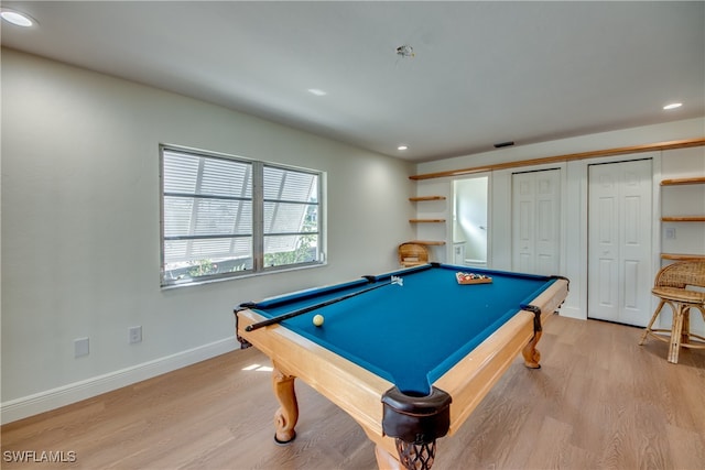 game room with light hardwood / wood-style flooring and billiards