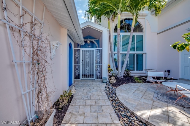 doorway to property featuring a patio