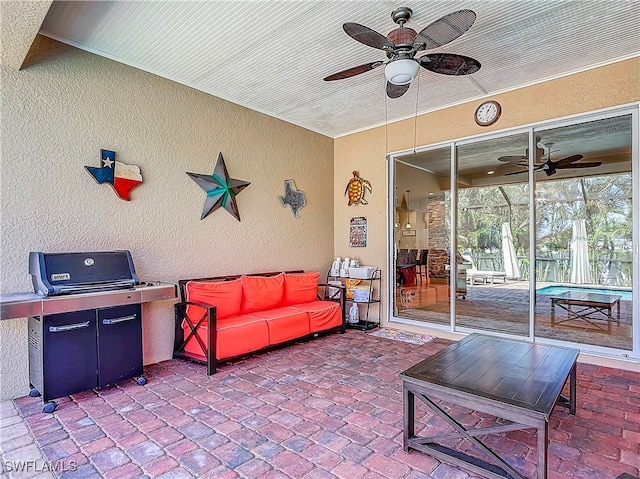 exterior space featuring ceiling fan