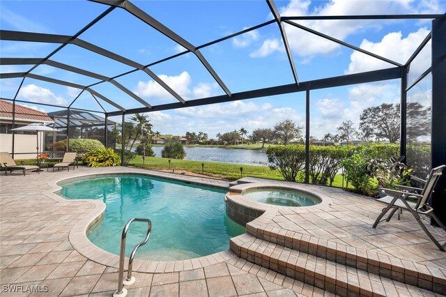 view of swimming pool featuring a lanai, a water view, a patio, and an in ground hot tub