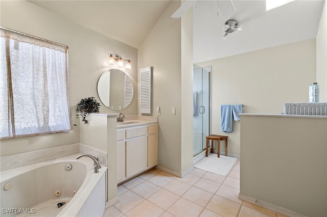 bathroom with tile patterned floors, separate shower and tub, vanity, and lofted ceiling