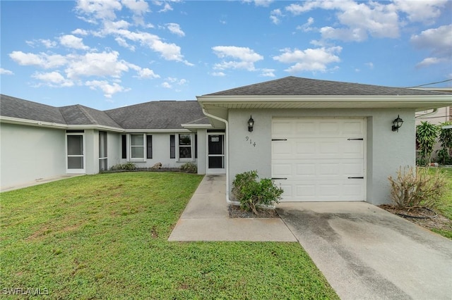 ranch-style house with a garage and a front lawn