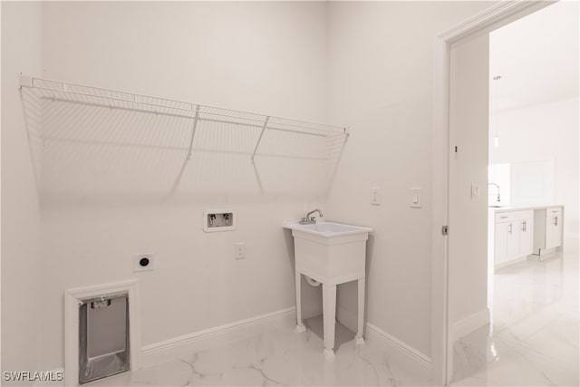 washroom featuring hookup for an electric dryer and washer hookup