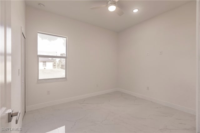 unfurnished room with ceiling fan