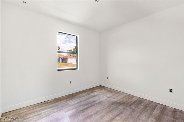 unfurnished room featuring light wood-type flooring