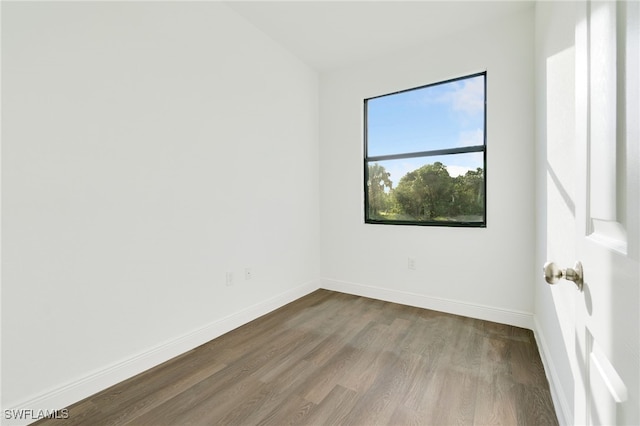 empty room featuring hardwood / wood-style floors