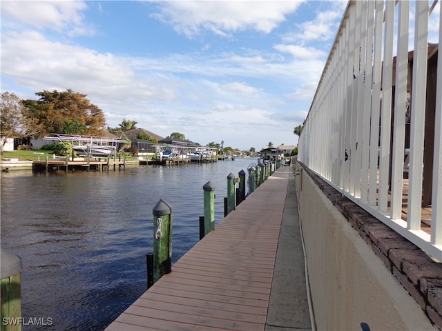 dock area featuring a water view