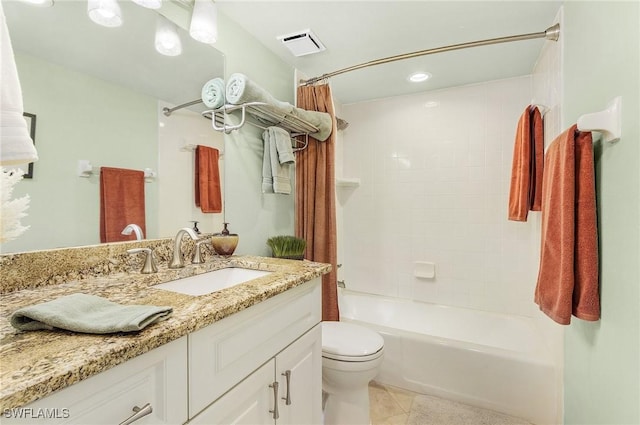 full bathroom with tile patterned floors, toilet, vanity, and shower / bath combination with curtain