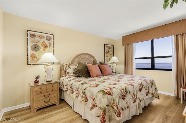 bedroom with light wood-type flooring