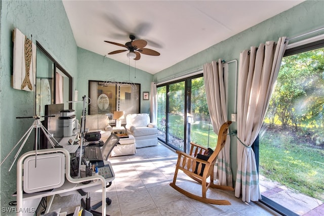 sunroom / solarium featuring vaulted ceiling and a ceiling fan