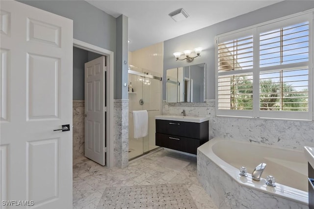 bathroom with a wealth of natural light, vanity, and plus walk in shower