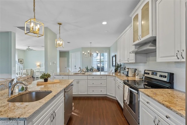 kitchen with ceiling fan, white cabinets, and appliances with stainless steel finishes