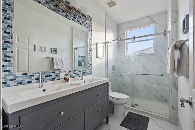 bathroom with vanity, toilet, an enclosed shower, and backsplash