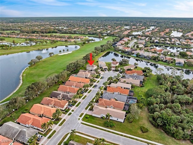 drone / aerial view with a water view