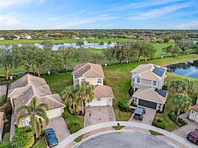 drone / aerial view with a water view