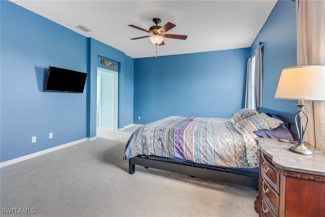 bedroom with ceiling fan and carpet