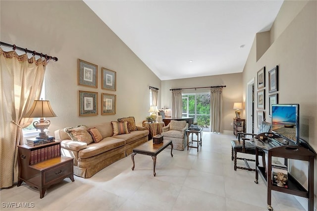 3555 Avion Woods Ct Unit 501, Naples, FL 34104 - living room featuring high vaulted ceiling
