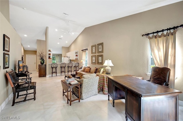3555 Avion Woods Ct Unit 501, Naples, FL 34104 - living room featuring plenty of natural light, ceiling fan, vaulted ceiling, and visible vents