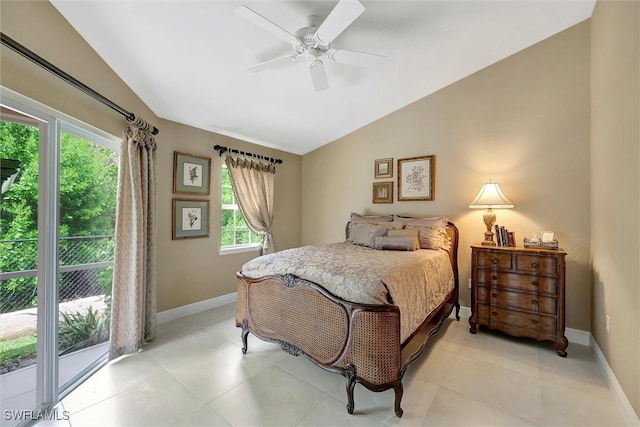 tiled bedroom featuring ceiling fan, multiple windows, access to outside, and vaulted ceiling