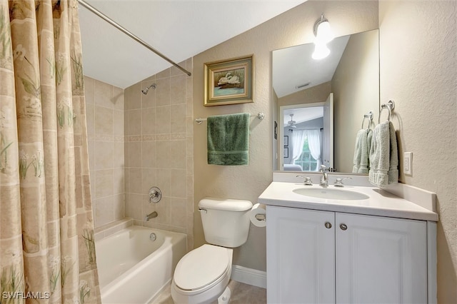 full bathroom featuring toilet, shower / tub combo, vanity, and vaulted ceiling