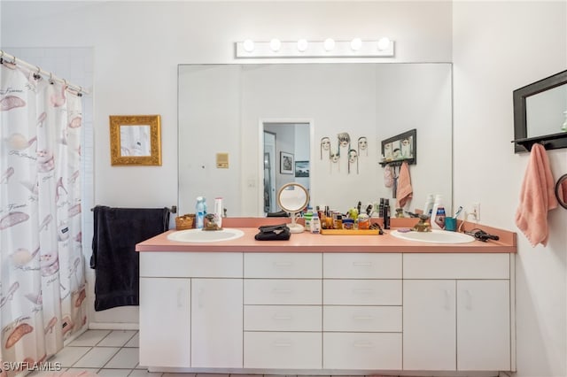 bathroom featuring vanity, a shower with curtain, and tile patterned floors