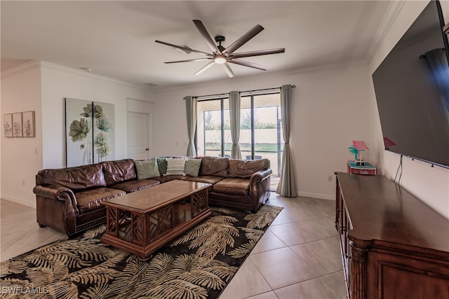 living room with crown molding, ceiling fan, and light tile patterned floors