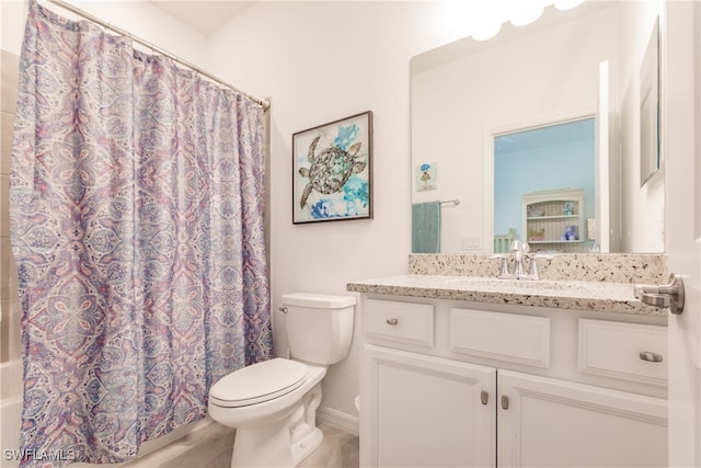 full bathroom featuring toilet, vanity, and shower / bath combination with curtain