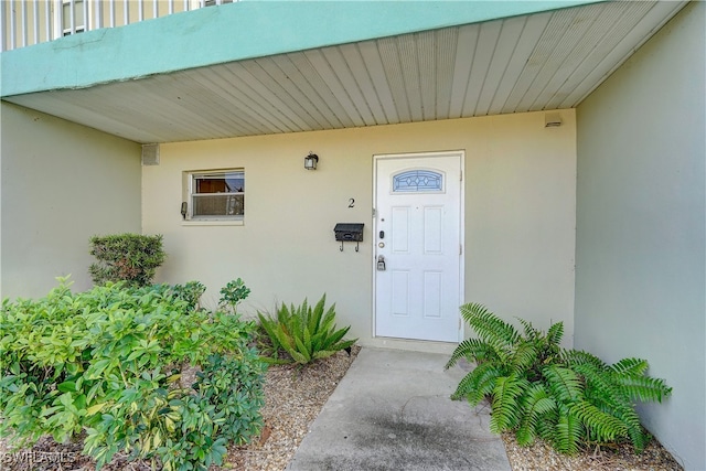 doorway to property featuring a balcony