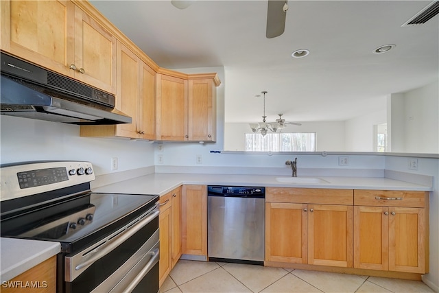 kitchen featuring ceiling fan with notable chandelier, appliances with stainless steel finishes, light tile patterned floors, and extractor fan