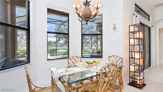 dining room with a chandelier