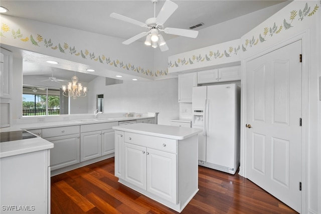 kitchen featuring white fridge with ice dispenser, white cabinetry, and dark hardwood / wood-style flooring