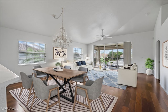 dining area with ceiling fan with notable chandelier, lofted ceiling, and dark hardwood / wood-style floors