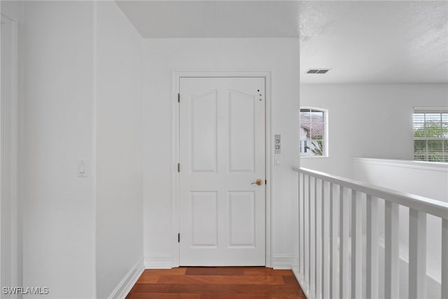 hall featuring hardwood / wood-style flooring