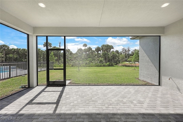 view of unfurnished sunroom