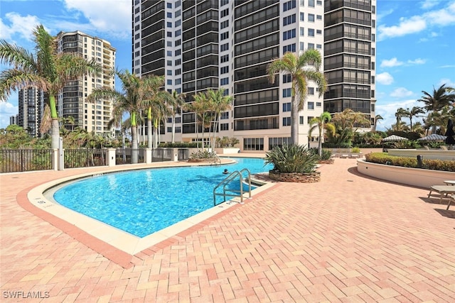 view of swimming pool featuring a patio