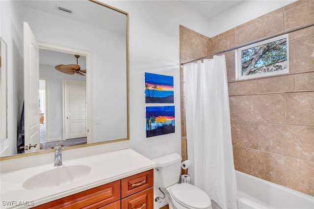 full bathroom with toilet, shower / tub combo with curtain, vanity, and ceiling fan