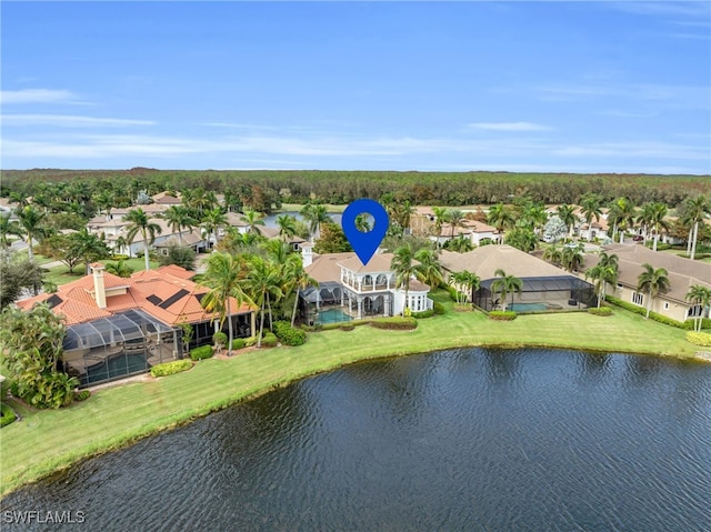 birds eye view of property featuring a water view