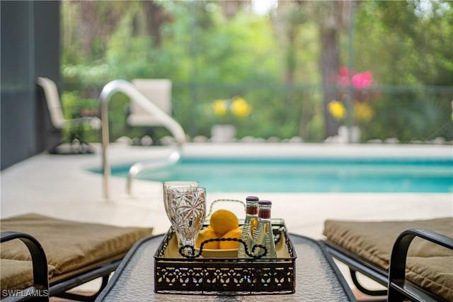 view of pool with a patio area