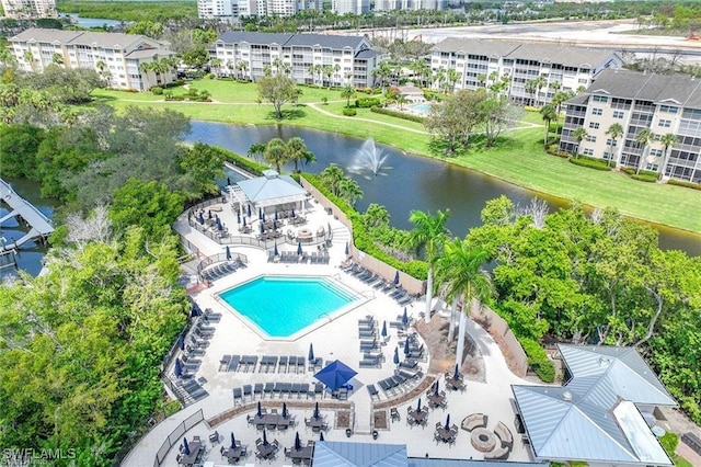 birds eye view of property featuring a water view