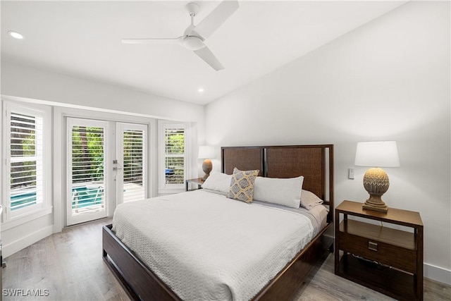 bedroom with ceiling fan, access to exterior, and hardwood / wood-style flooring