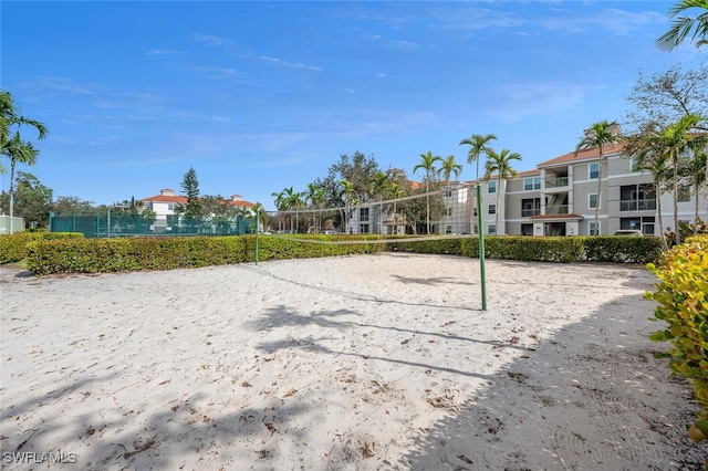 view of property's community featuring volleyball court