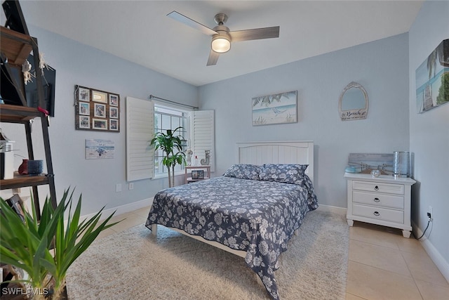 bedroom featuring light tile patterned flooring and ceiling fan