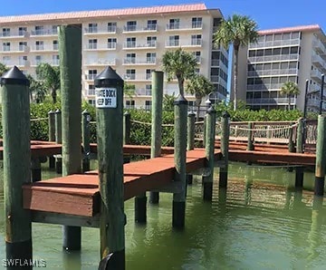 view of dock with a water view