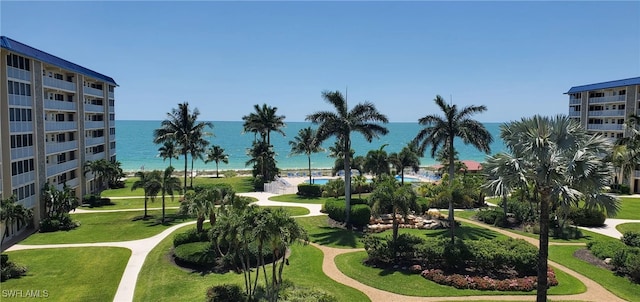 view of home's community with a water view