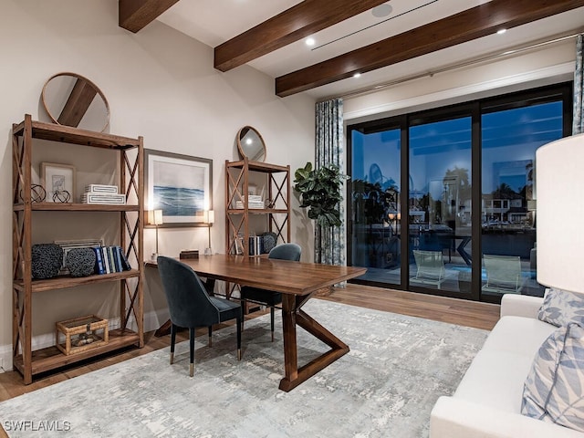 home office featuring beam ceiling and hardwood / wood-style flooring