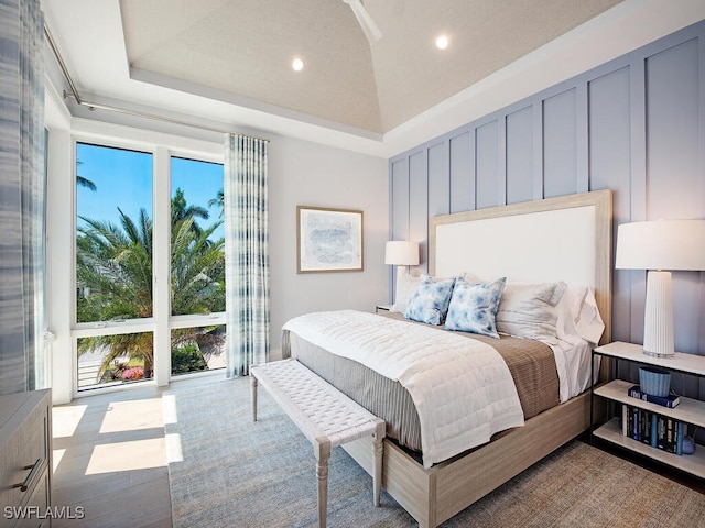 bedroom with a tray ceiling