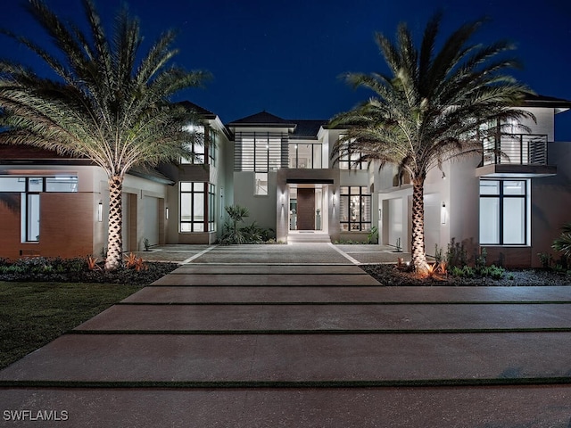 view of front of home with a garage