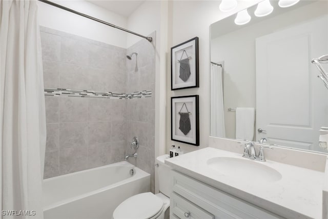 full bathroom featuring shower / bath combo with shower curtain, vanity, and toilet