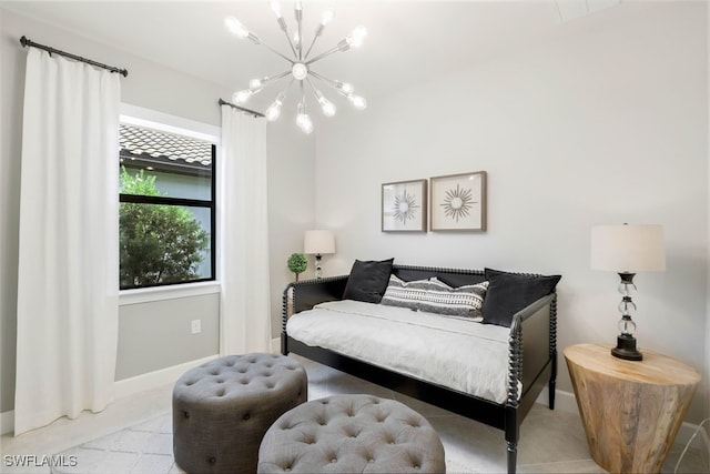 bedroom with a chandelier and light colored carpet